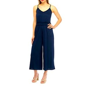 Kari Blue size L navy jumpsuit.  Flowy with elastic waist. So flattering for..